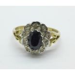 A 9ct gold sapphire and diamond cluster ring, 2.3g, N