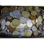 A tin of foreign coins