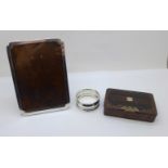 A silver photograph frame, a silver napkin ring and a Georgian snuff box, frame 9.5cm x 13cm, (snuff