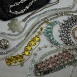 Assorted costume jewellery and an evening bag