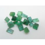 Seventeen unmounted emeralds, 1.8g total weight