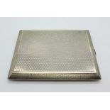 A silver cigarette case with machine turned finish, 145g