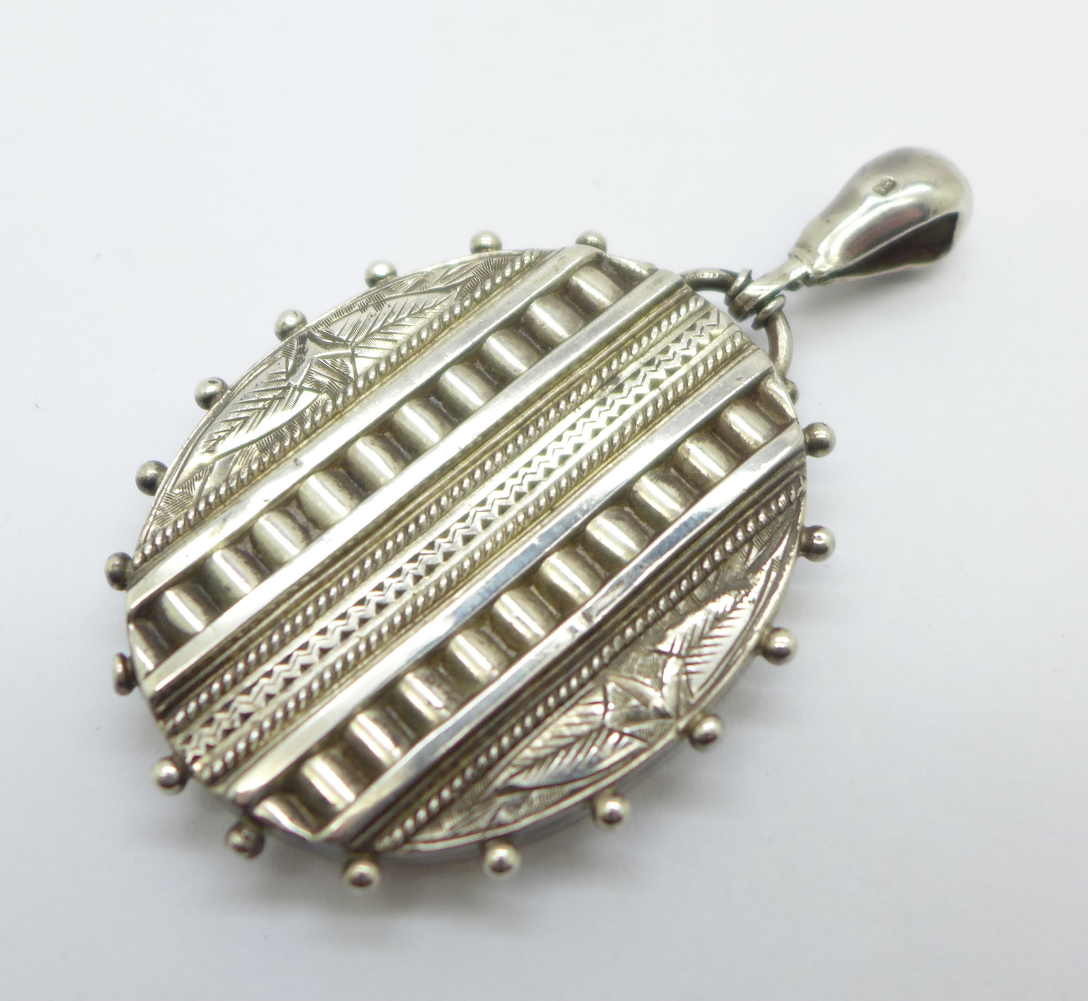 A Victorian silver locket, Birmingham 1873