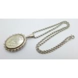 A silver locket and chain
