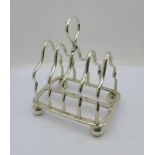 A silver toast rack, 123g