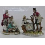 Two German porcelain figure groups; a couple with birds, small a/f (fingers) and three figures