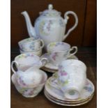 A Tuscan china pink floral six setting coffee service