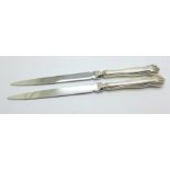 Two letter openers with silver handles