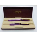 A Conway Stewart 570 and 54 pen set, 570 with 14ct gold nib, 54 a/f