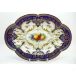 A Royal Worcester dish, hand decorated with fruit, signed Sebright, width 27cm