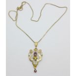 A yellow metal Art Nouveau pendant on a 9ct gold chain, 3.7g