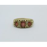 A 9ct gold, red and white stone ring, 2g, Q