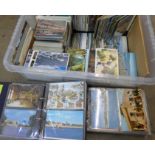 A box of modern postcards including three albums