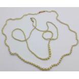 Two pearl necklaces with 9ct gold clasps