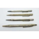 Four hallmarked silver pencils