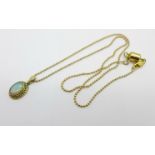 A 9ct gold and opal pendant on a 925 silver gilt chain with magnetic fastener, pendant 1.5g, opal