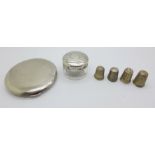 A silver Kigu compact, a silver topped jar and four silver thimbles including two Victorian