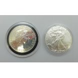 A 2007 Britannia one ounce fine silver brilliant uncirculated £2 coin and a 2021 USA 1oz fine silver