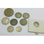 Nine Victorian silver coins, including an 1838 four pence and an 1838 half crown with mounted pin