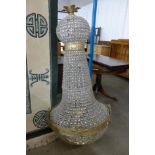 A large French Empire style gilt metal and glass bag shaped chandelier, approx. 160cms h