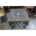A Burmese carved softwood occasional table