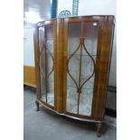 A walnut display cabinet