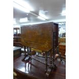 A Victorian inlaid rosewood Sutherland table