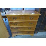 A yew wood chest of drawers