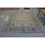A large Persian cream ground Khorasan rug, 300 x 245cms