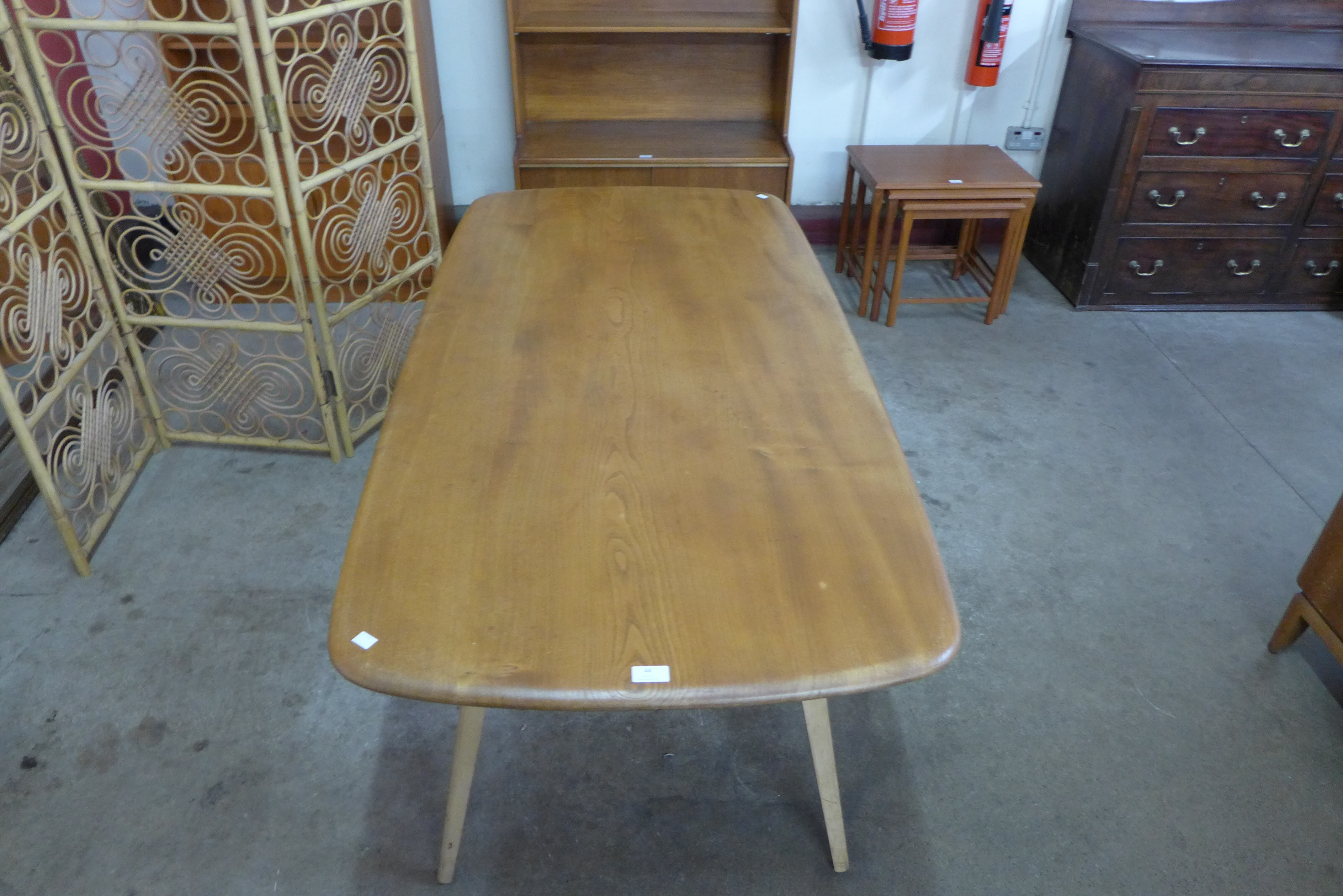 An Ercol Blonde elm and beech plank top dining table - Image 2 of 2