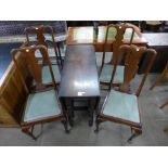 An oak gateleg table and four Queen Anne style mahogany chairs