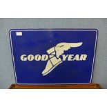 An aluminium painted Good Year sign