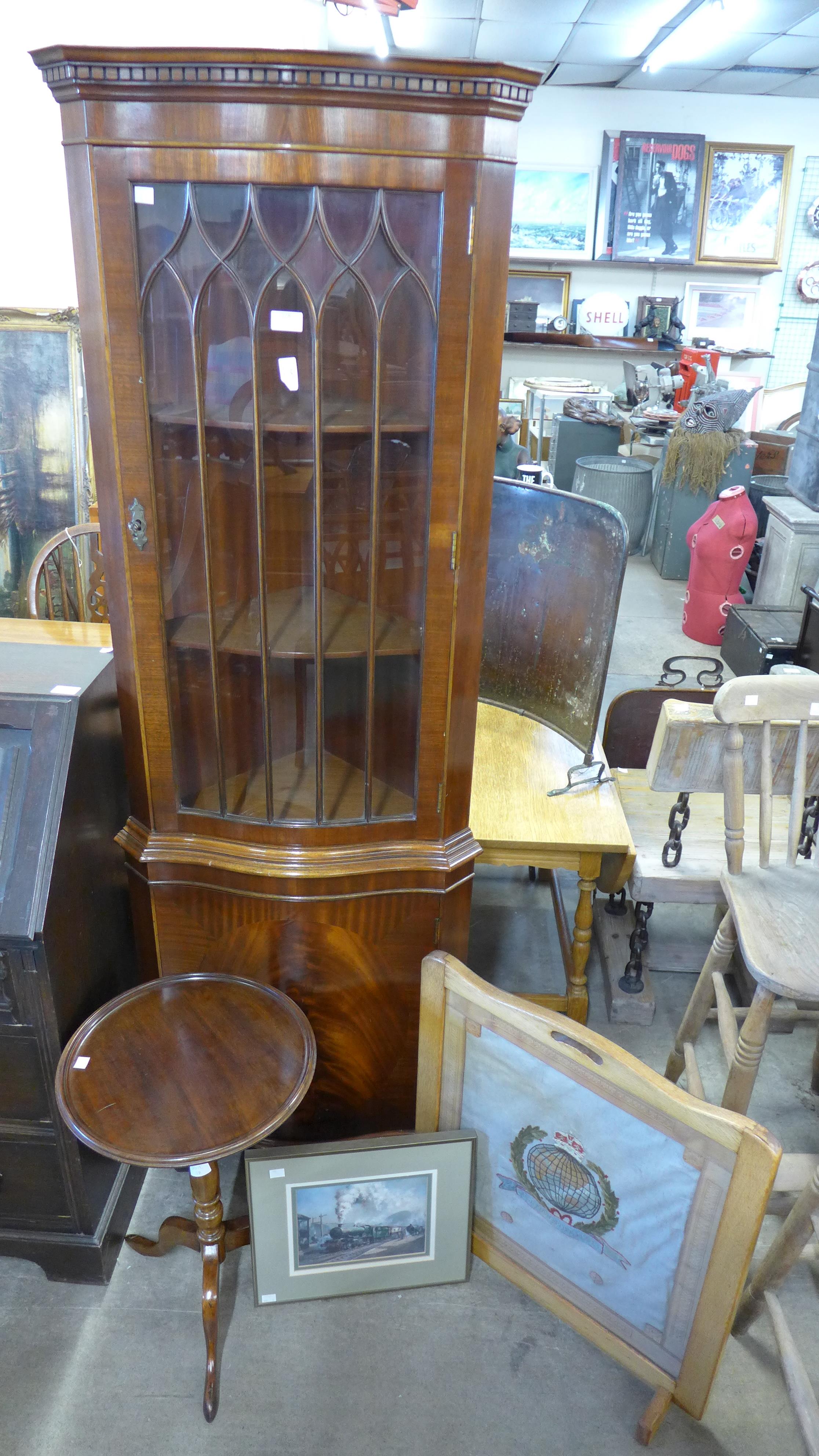 A mahogany freestanding corner cabinet, a tripod wine table, a Royal Marines embroidered fire screen