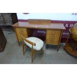 A teak and walnut desk and a chair