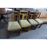 A set of four Art Deco light oak dining chairs