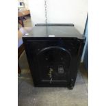 A Victorian painted cast iron fitted safe, with keys