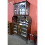 An Art Nouveau inlaid mahogany side cabinet, 207cms h, 122cms w, 41cms d