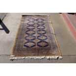 An eastern blue ground rug, 191 x 128cms