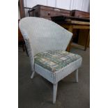 A Lloyd Loom Lusty white painted wicker chair