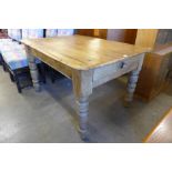 A Victorian pine farmhouse single drawer kitchen table
