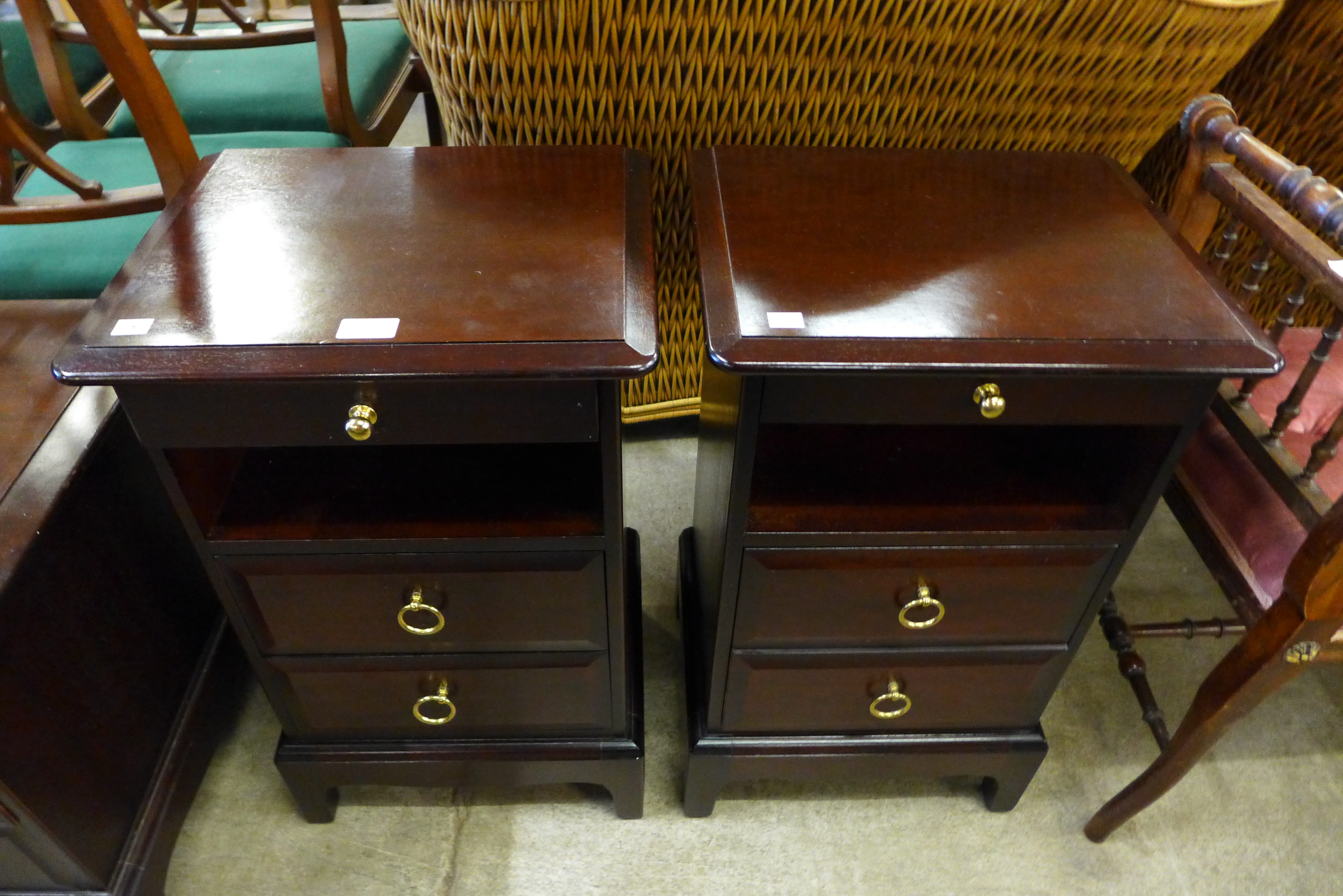 A pair of Stag Minstrel mahogany bedside chests