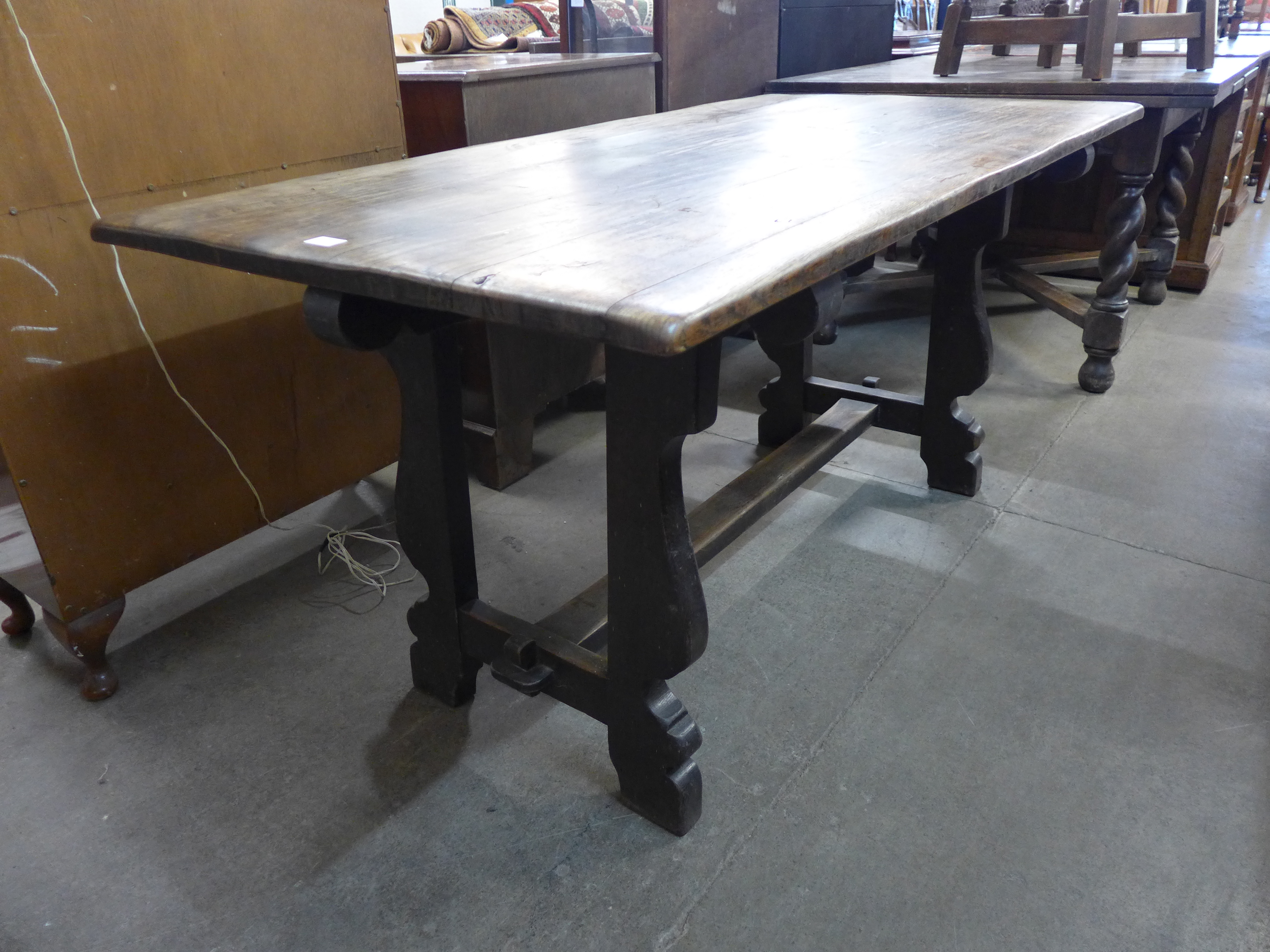 An Arts and Crafts joined oak refectory table