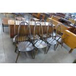 A set of eight Ercol Golden Dawn elm and beech Quaker chairs, one a/f