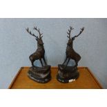 A pair of French style bronze stags, on black marble plinths, 43cms h