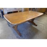 An Ercol Golden Dawn elm and beech coffee table