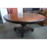 A Victorian mahogany circular breakfast table