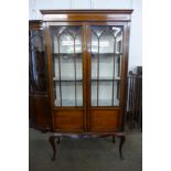 An Edward VII inlaid mahogany display cabinet