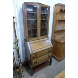 An oak bureau bookcase