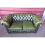 A Chesterfield green buttoned leather settee