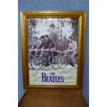 A Beatles print, framed